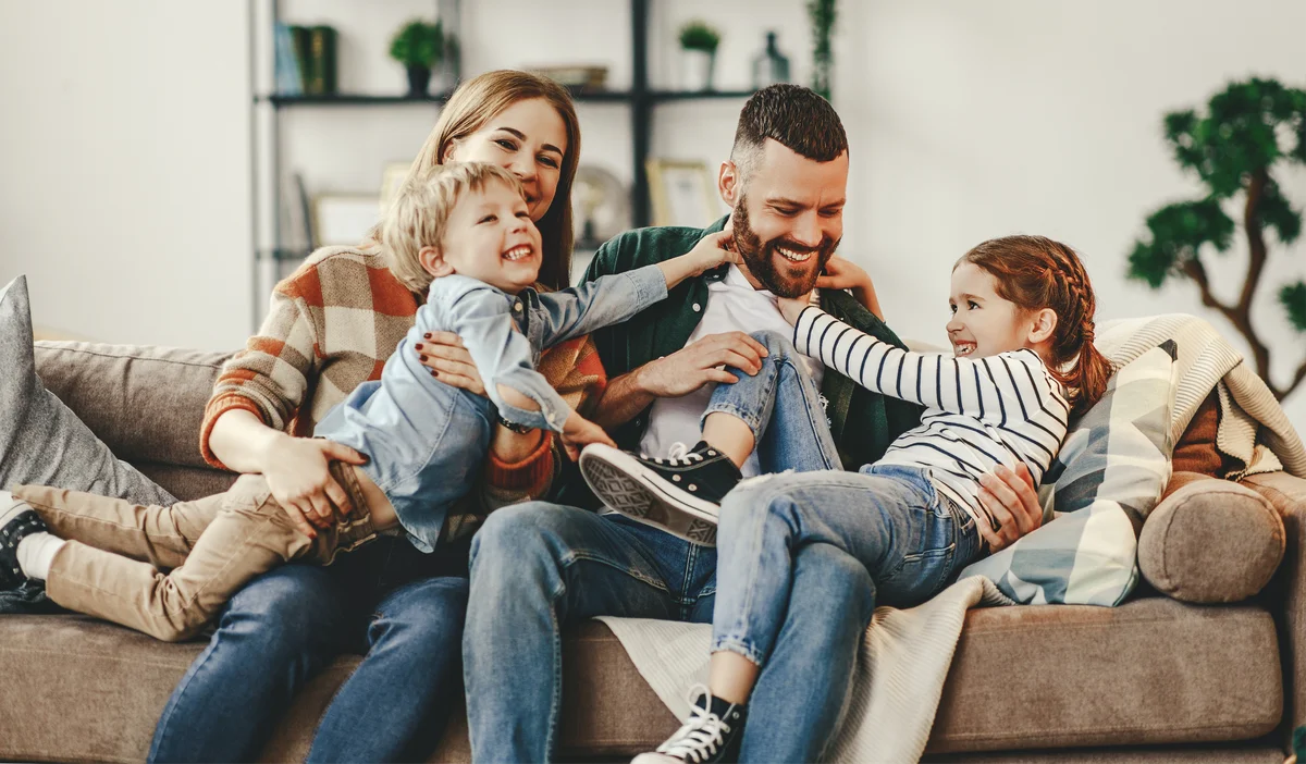 Happy family smiling together — family dentistry at Dentists 'R Us in Gilbert, AZ