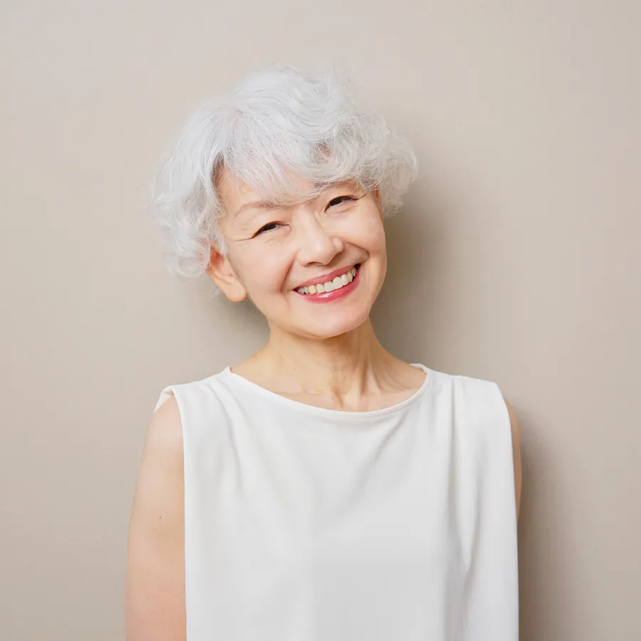 Patient smiling after gum disease treatment